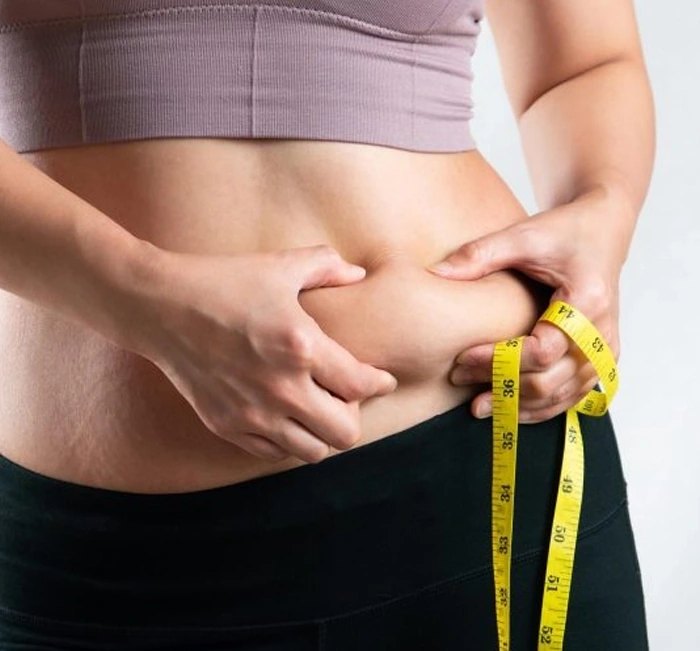 A measuring tape at the waist